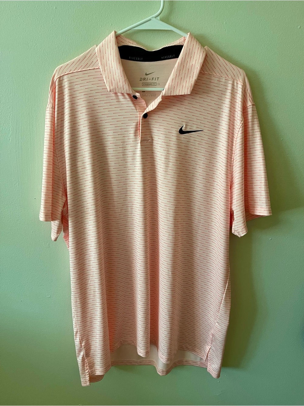 Nike Men's Light Pink Striped Dri-FIT Polo with Black Swoosh